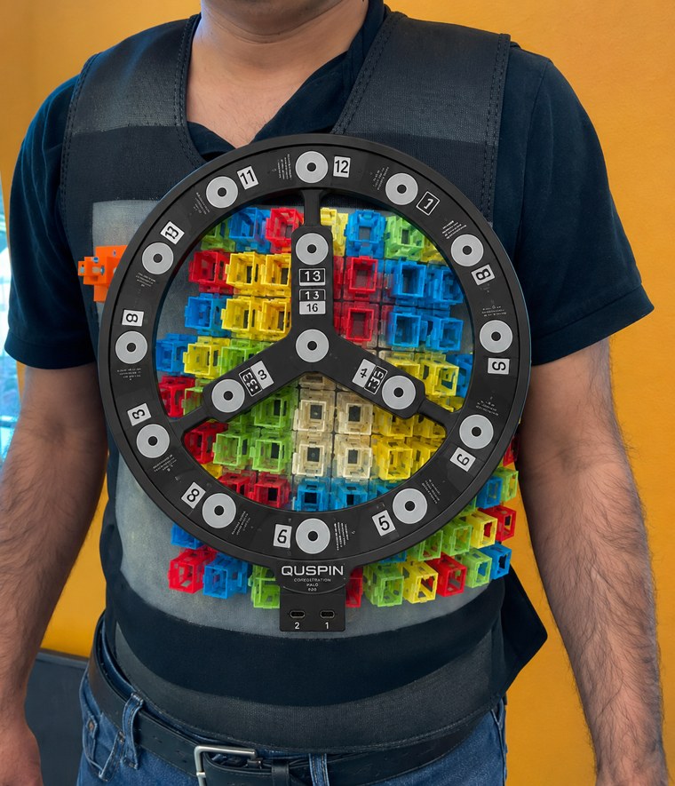 The sensor vest worn by the volunteer, with the HALO ring shown clipped on over the sensor grid