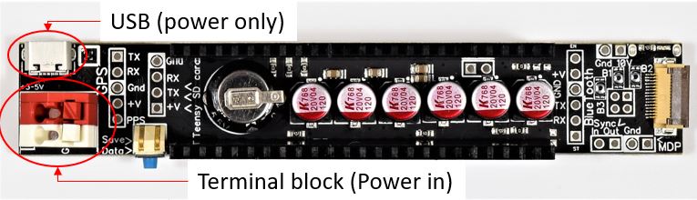 ACB power inputs: red and white terminal blocks, and the micro-USB connector
