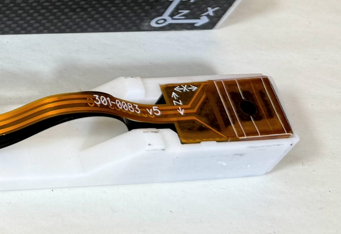 QTFM Gen-2 sensor head with the three-axis flex coil attachment
