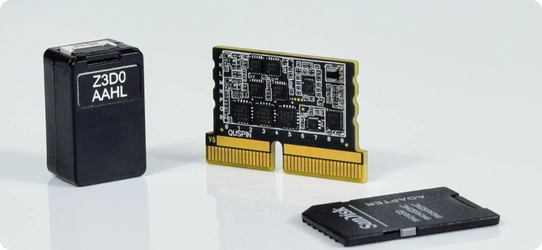 A QZFM sensor and a Cardmag sensor-control electronics card next to an SD card for scale