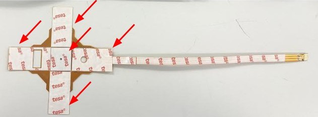 Vector coil flexible PCB with arrows marking the five adhesive-backing sections